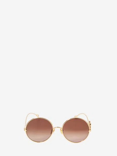 Chloé Round Frame Sunglasses Featuring Curved Temples In Gold