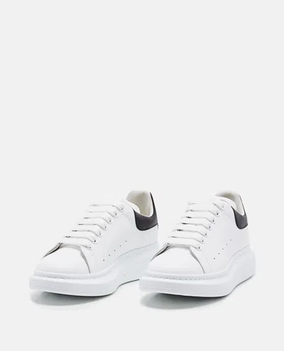 Alexander Mcqueen Men White And Black Low-top Sneakers With Chunky Sole And Contrasting Heel Tab In