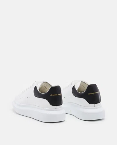 Alexander Mcqueen Men White And Black Low-top Sneakers With Chunky Sole And Contrasting Heel Tab In