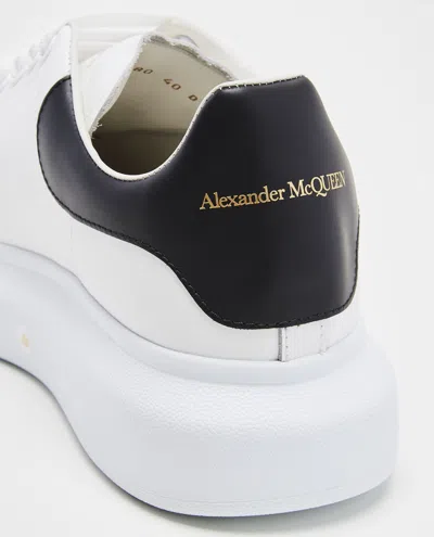 Alexander Mcqueen Men White And Black Low-top Sneakers With Chunky Sole And Contrasting Heel Tab In