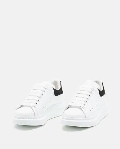 Alexander Mcqueen Black And White Low Top Sneakers With Logo Lettering On The Tongue And Contrasting Heel With Logo Le In Neutral
