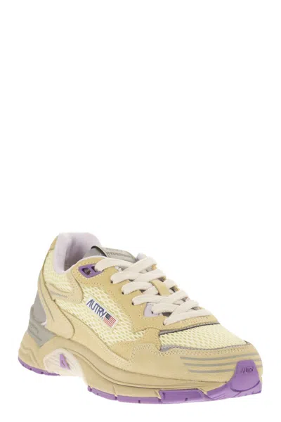 Autry Hyperway Suede And Mesh Trainers In Gold