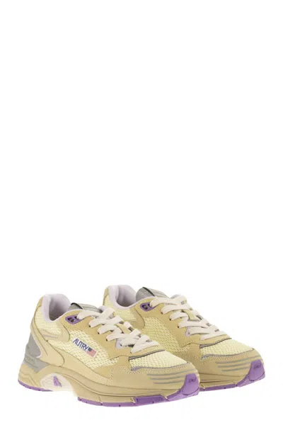 Autry Hyperway Suede And Mesh Trainers In Gold