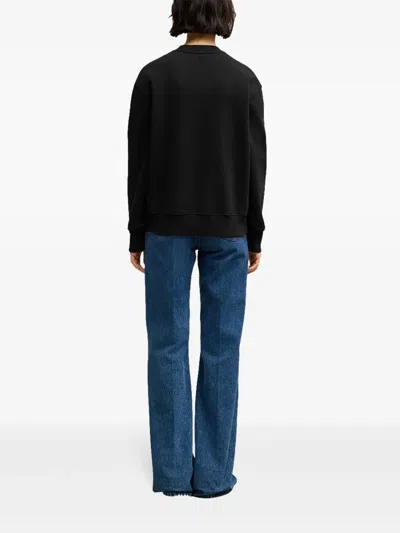 Ami Alexandre Mattiussi Ami Paris Men Black Crewneck Sweater With Adc Embroidery On The Front In Wool Blend Man In Multi