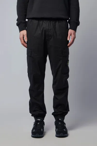 Stone Island Loose-fit Joggers With Pockets And Elasticateed Cuffs In Black