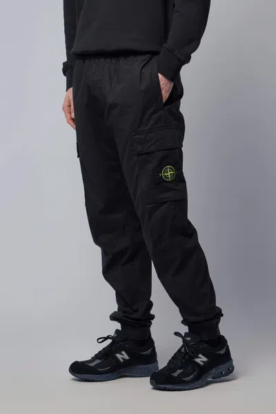 Stone Island Loose-fit Joggers With Pockets And Elasticateed Cuffs In Black