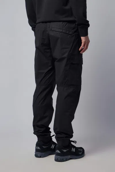 Stone Island Loose-fit Joggers With Pockets And Elasticateed Cuffs In Black