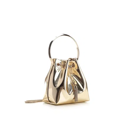 Jimmy Choo Shiny Mirror-effect Bon Bon Bag With Chain Drawstring And Metal Handle In Gold