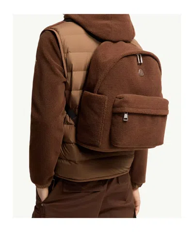 Moncler Logo Patch Zipped Backpack In Brown