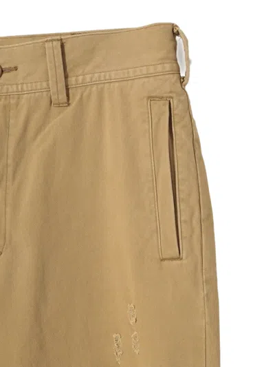 Undercover Patchwork Distressed Trousers In Neutral