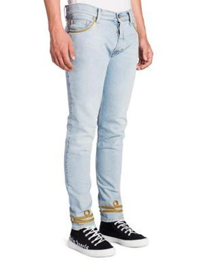 Shop Palm Angels Honor Skinny Fit Jeans In Light Blue
