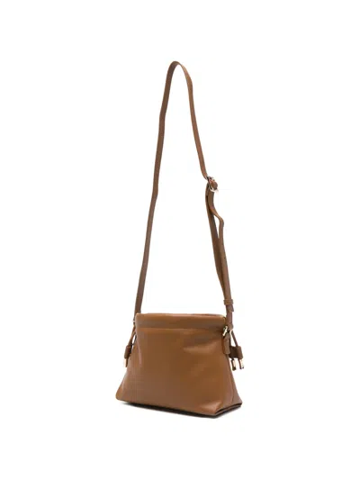 A.p.c. A. P.c. Ninon Drawstring-fastening Shoulder Bag In Orange