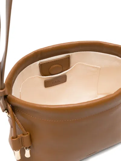 A.p.c. A. P.c. Ninon Drawstring-fastening Shoulder Bag In Orange