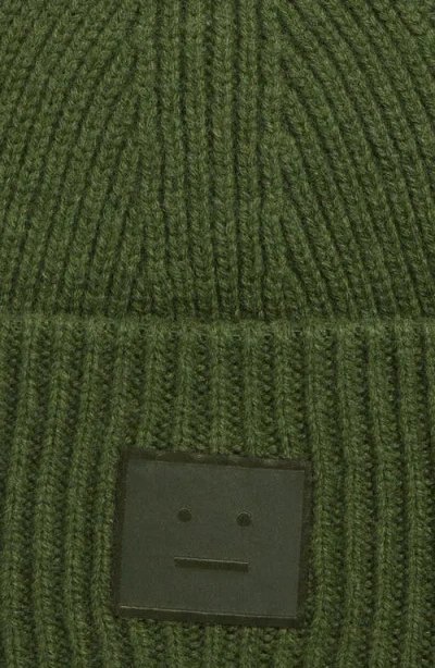 Acne Studios C40453-aaz Logo-embroidered Wool Beanie In Green