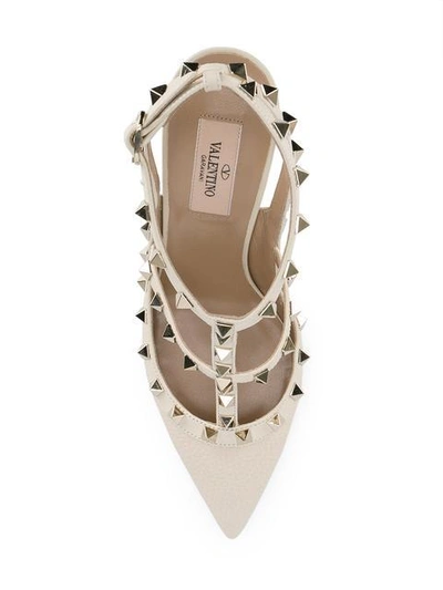 Shop Valentino Rockstud Pumps In Neutrals