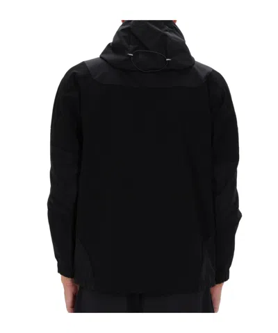 And Wander Stretch Shell Jacket In Black