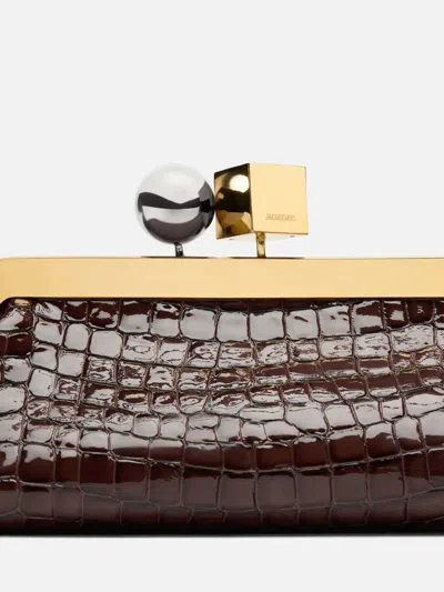 Jacquemus La Pochette Salon Crocodile-effect Glossed Leather Clutch In Brown