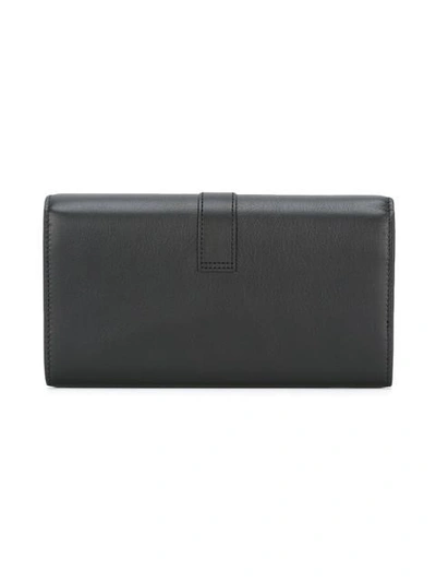 Shop Saint Laurent Monogram Flap Wallet In Black