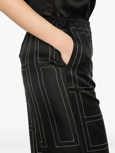 Totême Toteme Women Silk Trousers With Monogram Logo Embroidery In Multi