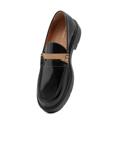 Maison Margiela Sophisticated Loafers For Men In Black