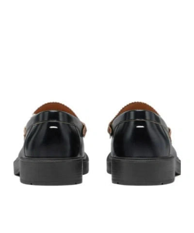Maison Margiela Sophisticated Loafers For Men In Black