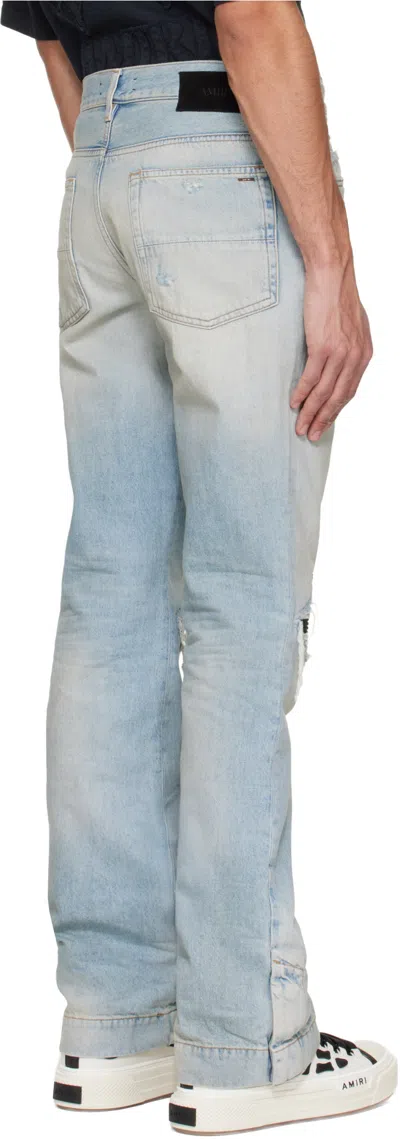 Amiri Distressed-effect Flared Jeans In Blue