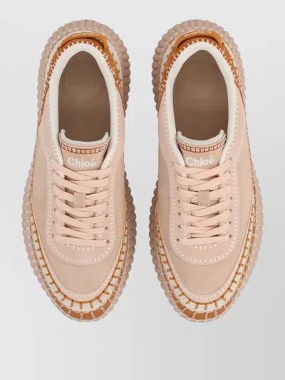 Chloé Low Top Sneakers Featuring Contrast Stitching And Textured Sole In Neutral