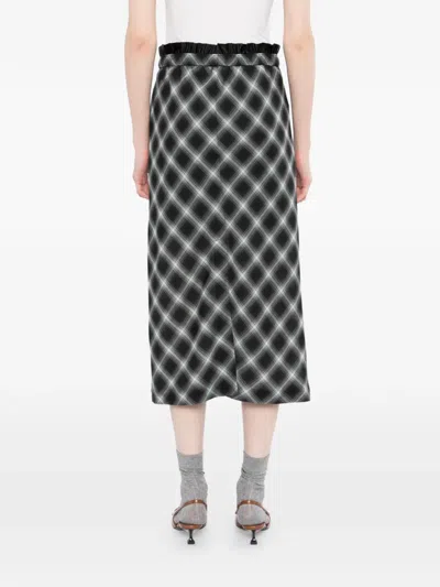 Less Plaid Midi Skirt In Black