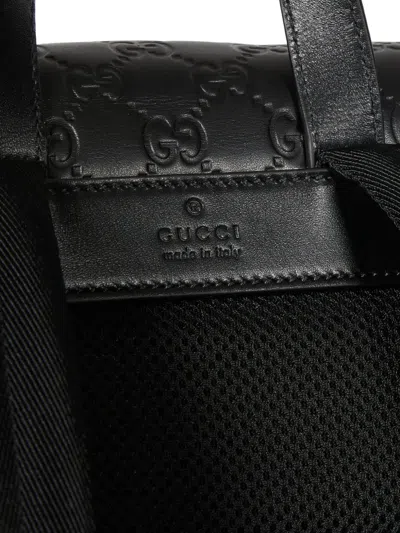 Gucci Medium Gg Emblem Backpack In Orange