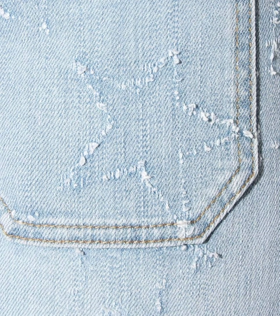 Shop Stella Mccartney Distressed Star Flared Jeans In Blue
