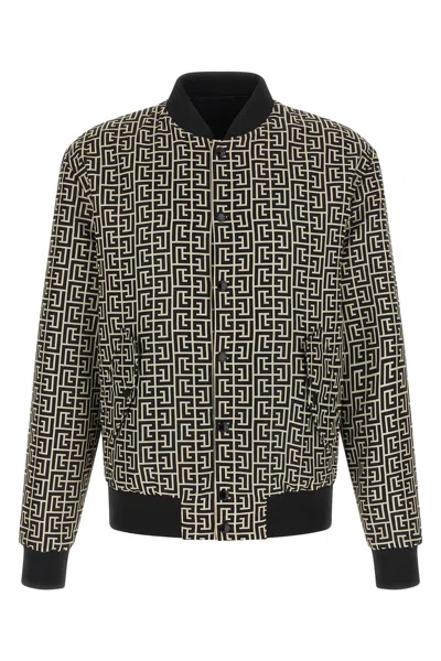 Balmain Monogram Reversible Bomber Jacket In Black