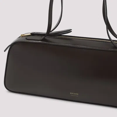 Khaite Simona Crackle Patent Elongated Tote Bag In Brown