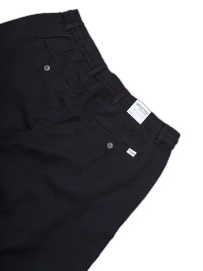 DRAWSTRING TROUSERS
