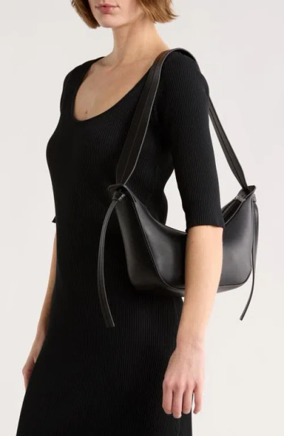 Bcbg Knotted Strap Sling Shoulder Bag In Black