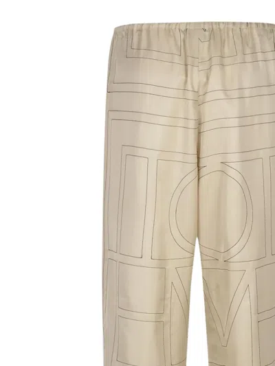 Totême Monogram Silk Straight-leg Ankle Pajama Pants In Brown