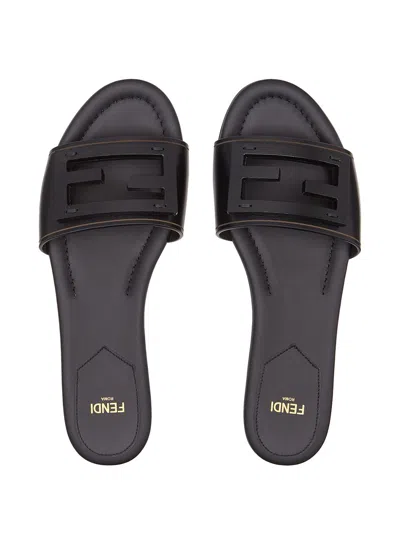 Fendi Baguette Ff Tube Medallion Flat Sandals In Black