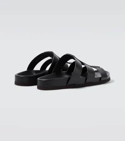 Valentino Garavani Studshield Logo-embellished Leather Sandals In Black