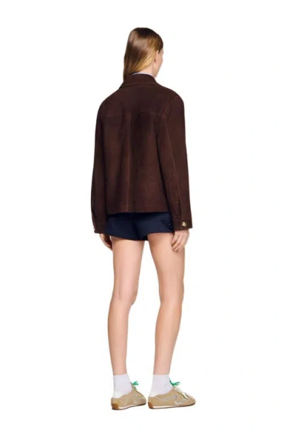 Sandro Buttoned Pocket Leather Jacket In Brown
