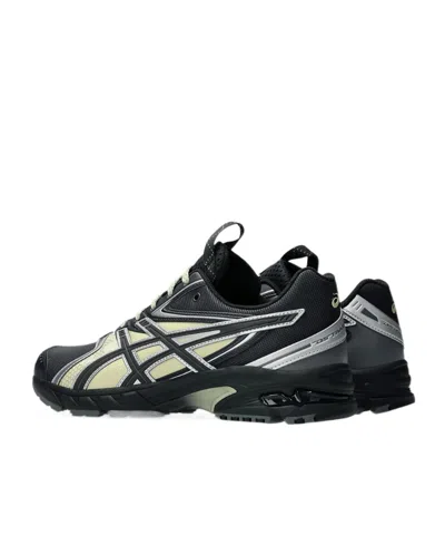 Asics Rounded Toe Sneakers With Grooved Sole And Sleek Finish In Gray