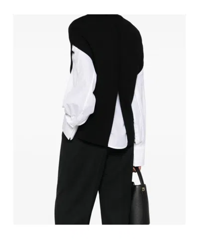 Totême Wool Turtleneck Vest Layered Design In Black