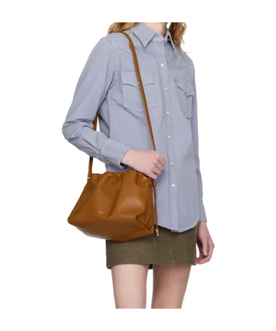 A.p.c. A. P.c. Ninon Drawstring-fastening Shoulder Bag In Brown