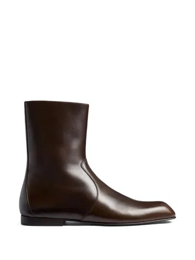 Khaite Colt Glossed Leather Ankle Boots In Brown