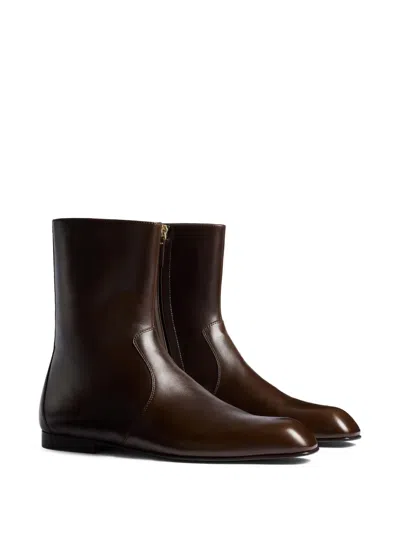 Khaite Colt Glossed Leather Ankle Boots In Brown