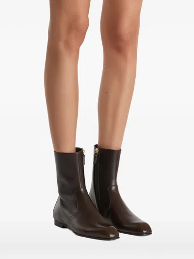 Khaite Colt Glossed Leather Ankle Boots In Brown