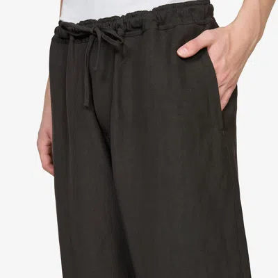 Studio Nicholson Drawstring Trousers In Brown