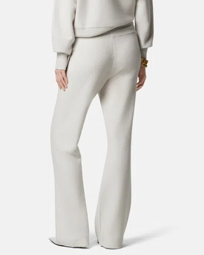 Versace Drawstring-fastening Knitted Flared Trousers In Multi