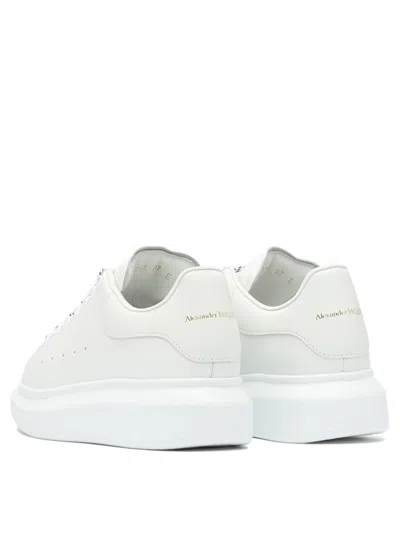 Alexander Mcqueen White Low Top Sneakers With Logo Lettering On Tongue And Heel In Leather Woman