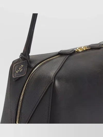 Alaïa Le Bouledogue Bowling Shoulder Bag In Nubuck Leather In Black