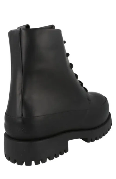 Ferragamo Rubberized Leather Combat Boots In Black