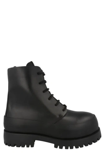 Ferragamo Rubberized Leather Combat Boots In Black